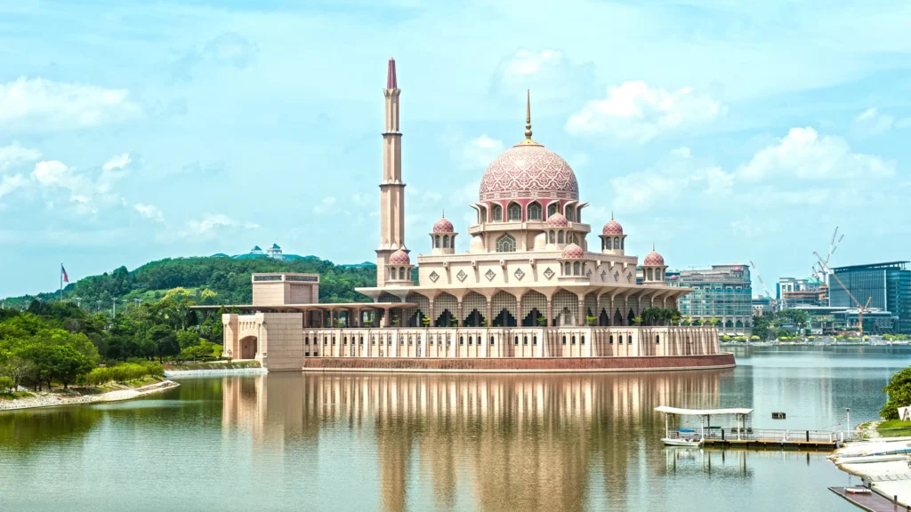 Beautiful view of Putra Mosque in Malaysia with its pink dome and reflecting pool