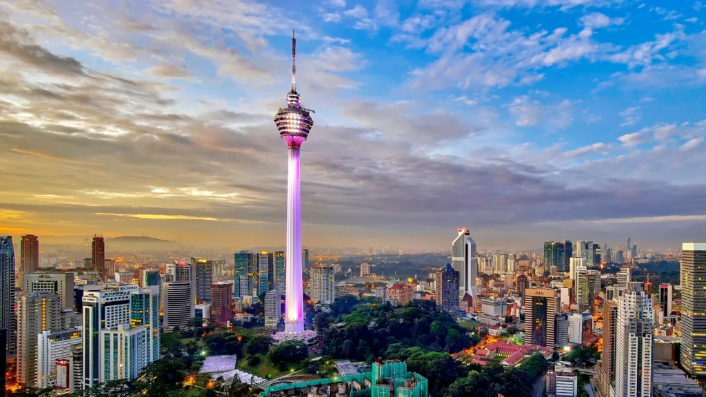Menara Kuala Lumpur (KL Tower) standing tall against the city skyline of Kuala Lumpur